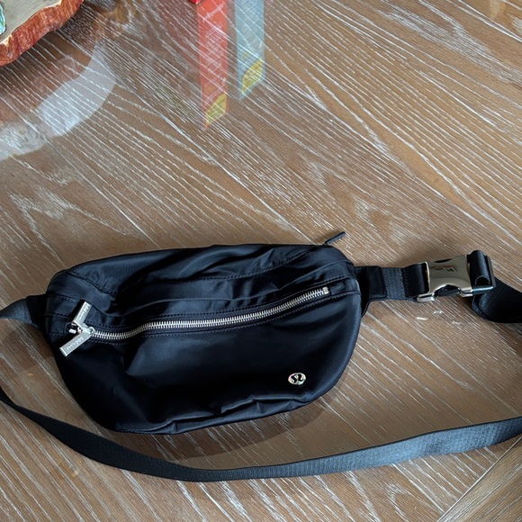 lululemon athletica Handbags - lululemon athletica Black Nylon Belt Bag with Silver Hardware